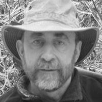 Charles Dickson in a sun hat